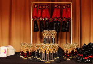 black and red fashion show trophies